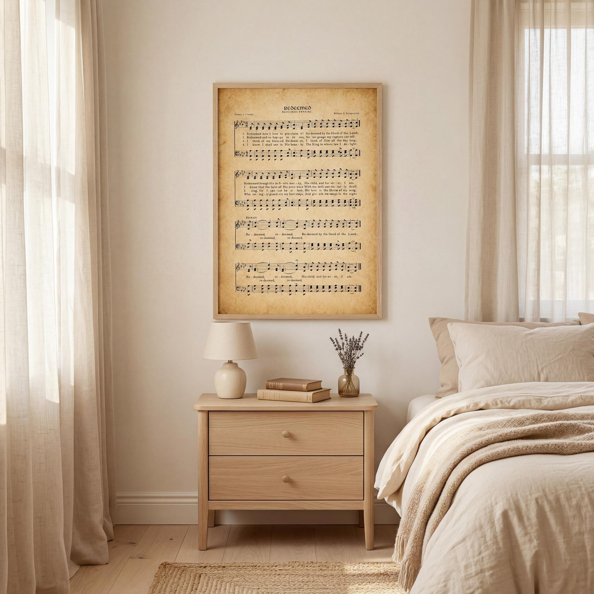 A bedroom with a bed, nightstand, and a framed sheet music poster on the wall.