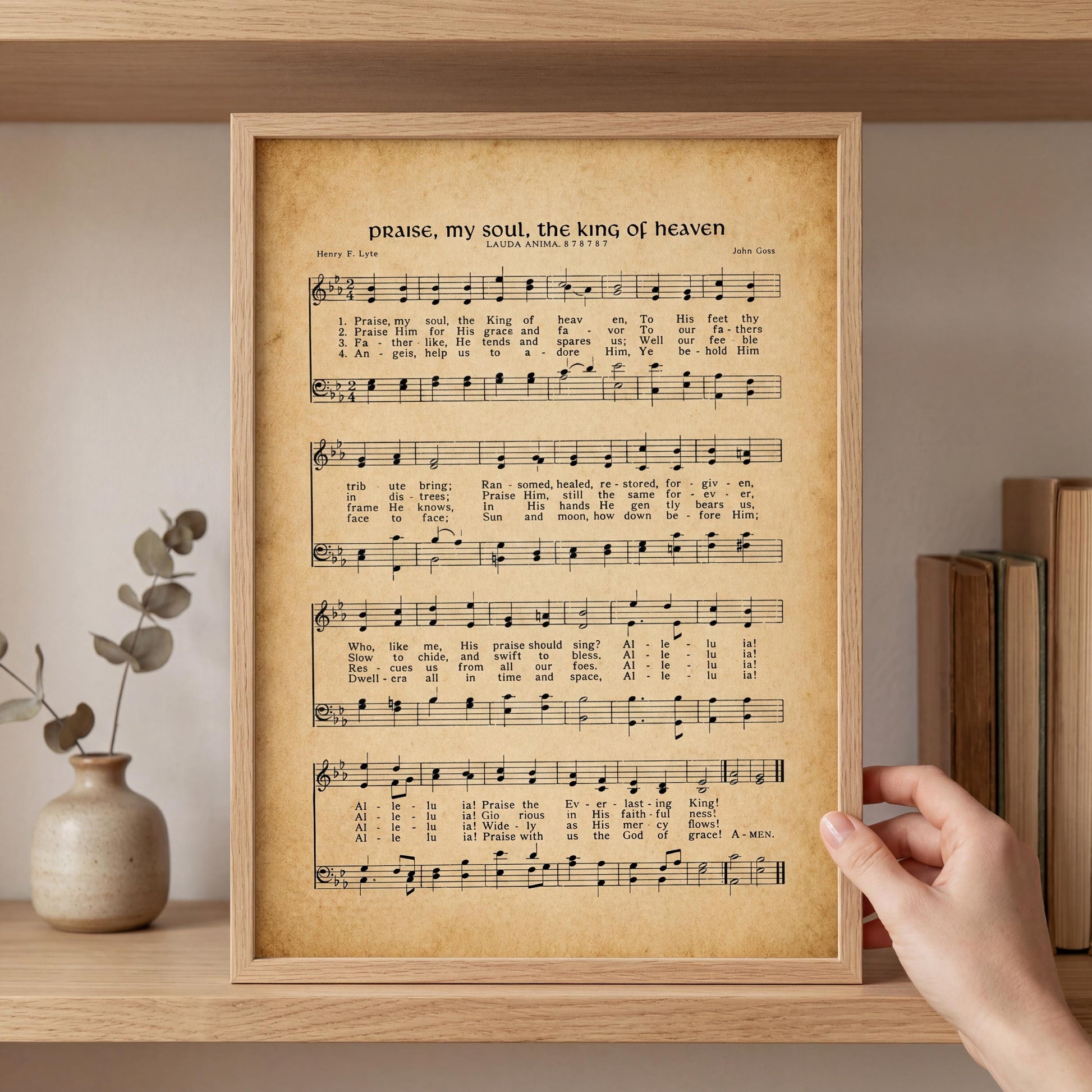 A framed sheet of music titled "Prayer, my soul, the king of heaven" by Henry F. Lyte, with sheet music displayed on the frame.